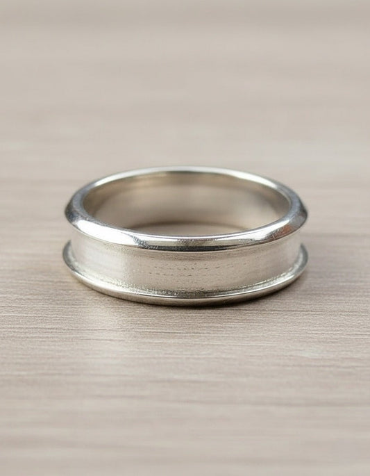 Silver inlay ring on a beige surface
Milky Way Spirit & Soul Keepsakes